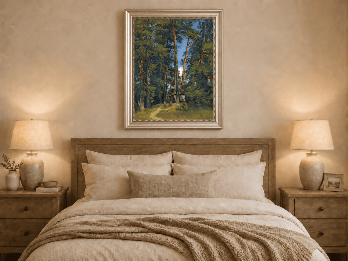 Framed hand-painted pine forest oil painting with a small elevated cabin among tall trees displayed above a wooden bed in a neutral bedroom.