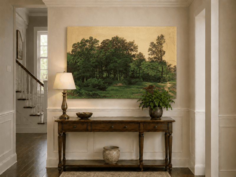 Unframed hand-painted forest glade oil painting with a winding stream displayed above an entryway console table.