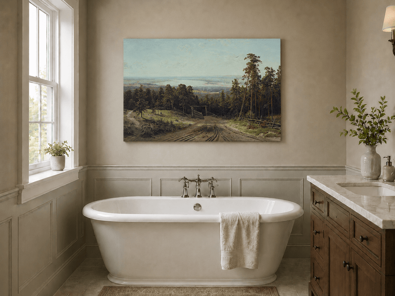 Unframed hand-painted forest path oil painting leading toward a distant lake displayed above a freestanding bathtub.