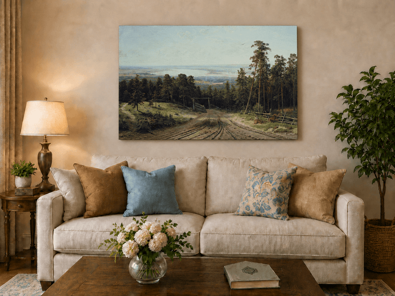 Unframed hand-painted forest path oil painting leading toward a distant lake displayed above a neutral living room sofa.
