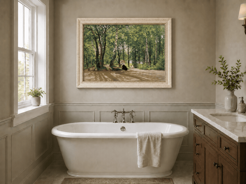 Framed hand-painted forest path oil painting with a figure resting near a bench displayed above a freestanding bathtub.