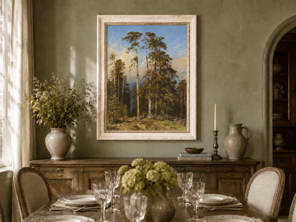 Framed hand-painted forest path oil painting with tall pine trees and a sandy trail displayed above a formal dining table.