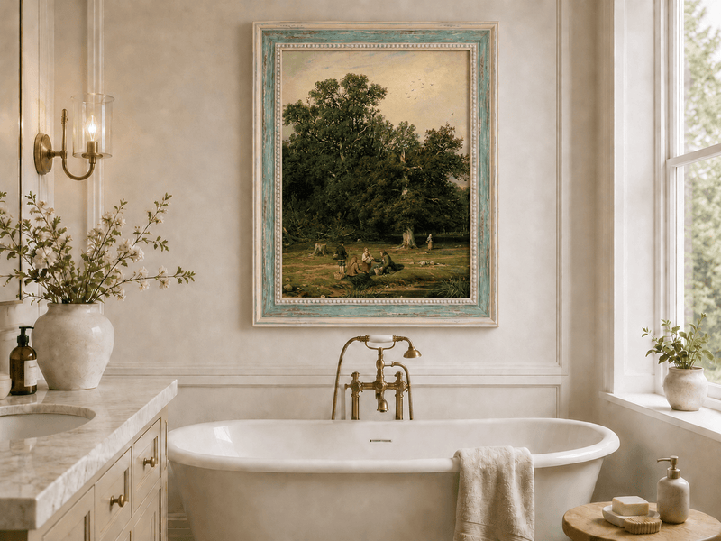 Framed hand-painted forest stream oil painting with figures beneath a large tree displayed above a freestanding bathtub.