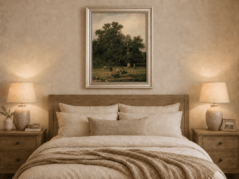 Framed hand-painted forest stream oil painting with figures beneath a large tree displayed above a wooden bed in a neutral bedroom.