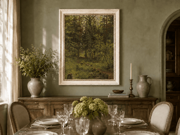 Framed hand-painted woodland stream oil painting with dense trees and shadowed water displayed above a formal dining table.