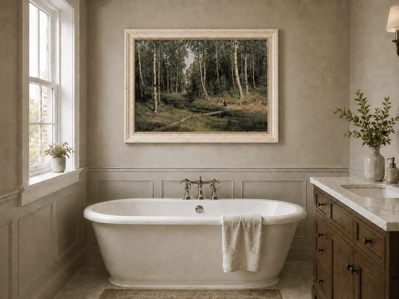 Framed hand-painted forest stream oil painting with figures among the trees displayed above a freestanding bathtub.