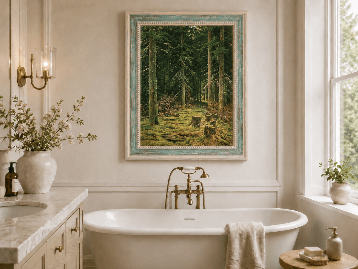 Framed hand-painted evergreen forest oil painting with tree stumps and mossy ground displayed above a freestanding bathtub.