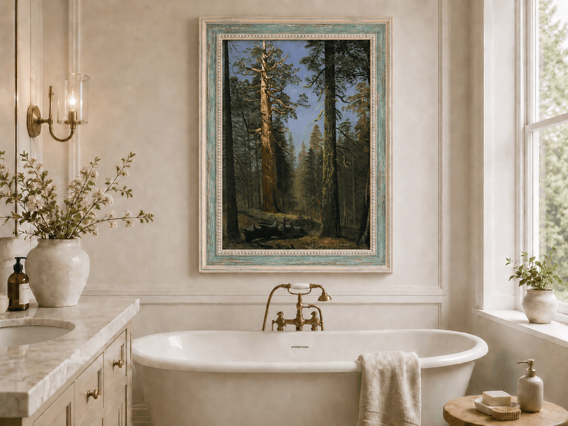 Framed hand-painted giant sequoia forest oil painting with towering trees and sunlight displayed above a freestanding bathtub.