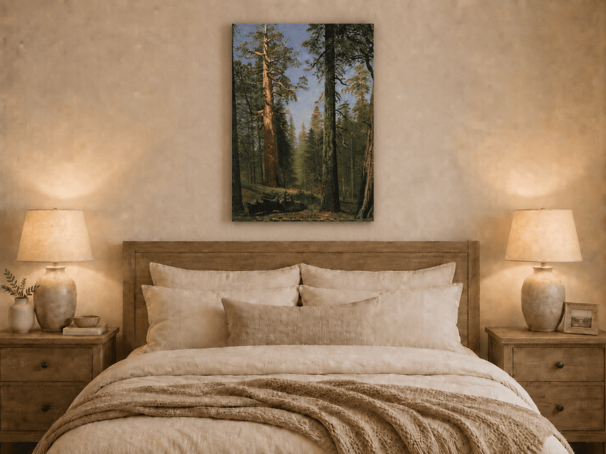 Unframed hand-painted giant sequoia forest oil painting with towering trees and sunlight displayed above a wooden bed in a neutral bedroom.