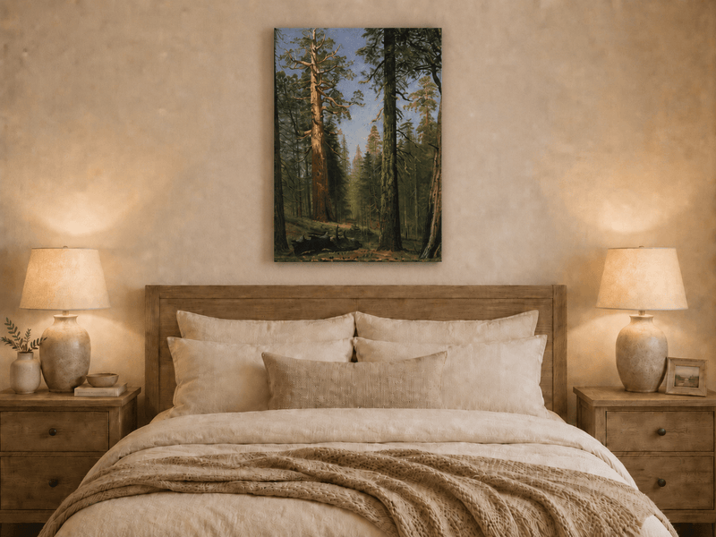 Unframed hand-painted giant sequoia forest oil painting with towering trees and sunlight displayed above a wooden bed in a neutral bedroom.