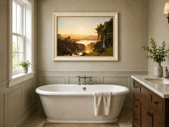Framed hand-painted golden canyon oil painting with a lake and distant waterfall displayed above a freestanding bathtub.