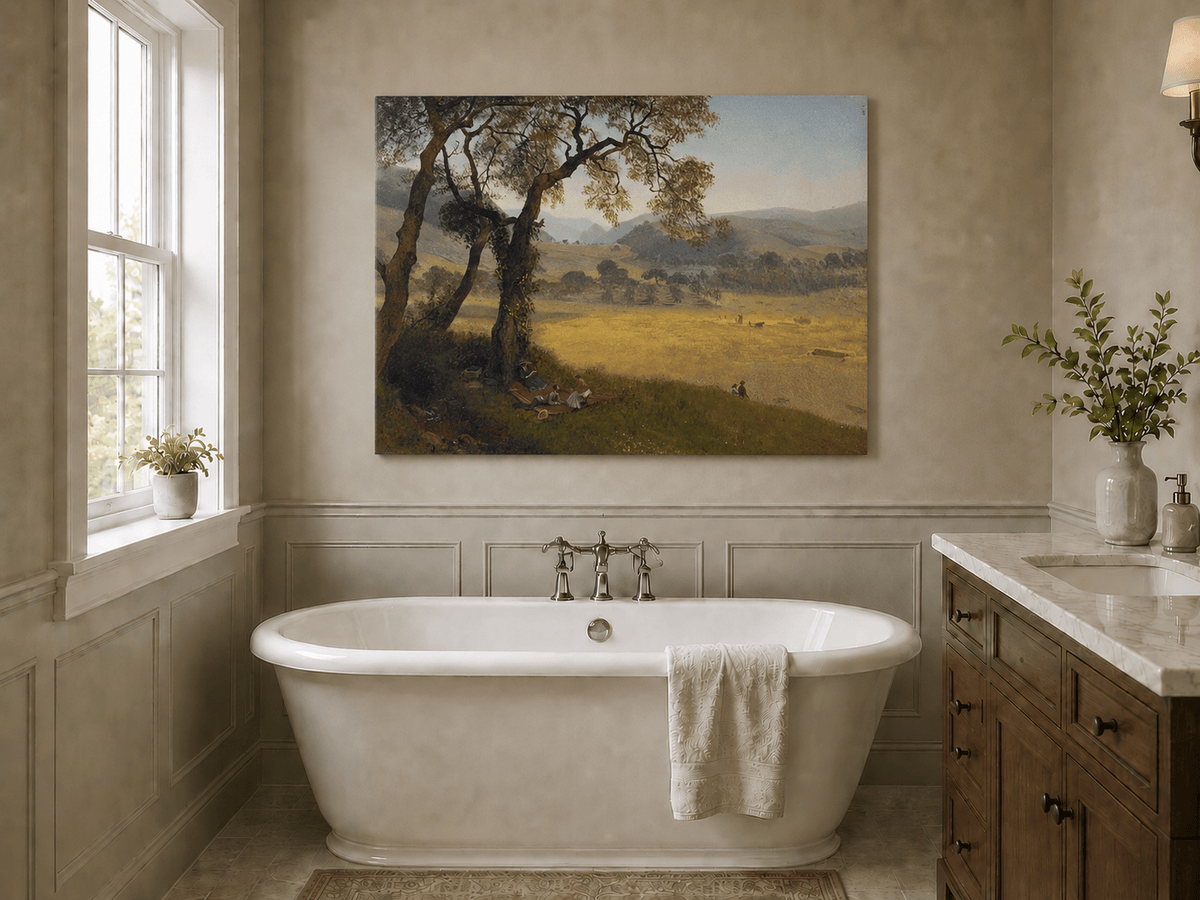 Unframed hand-painted golden meadow oil painting with a picnic scene beneath a broad tree displayed above a freestanding bathtub.