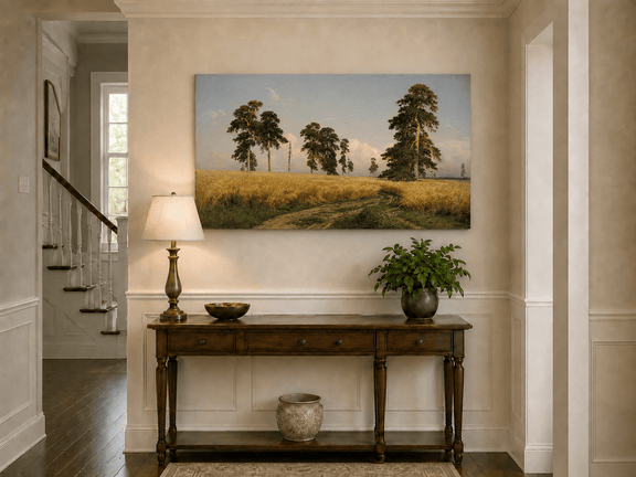 Unframed hand-painted golden wheat field oil painting with pine trees and a country path displayed above an entryway console table.