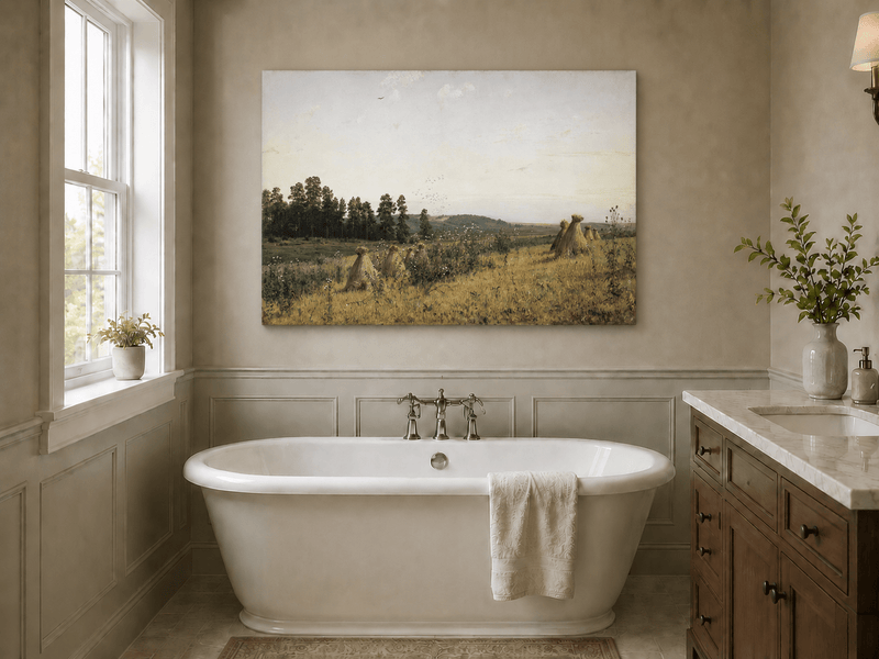Unframed hand-painted harvest field oil painting with haystacks and distant farm workers displayed above a freestanding bathtub.
