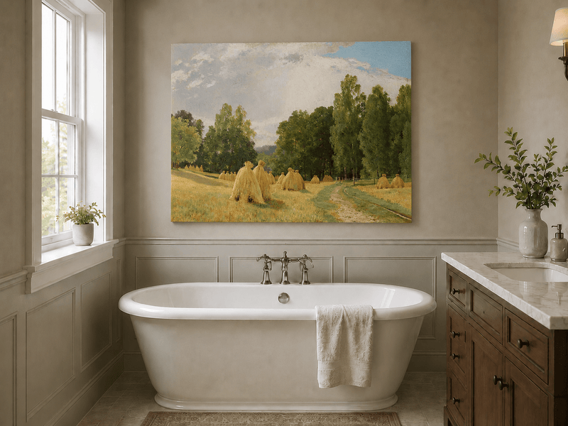 Unframed hand-painted harvest field oil painting with haystacks and a tree-lined path displayed above a freestanding bathtub.