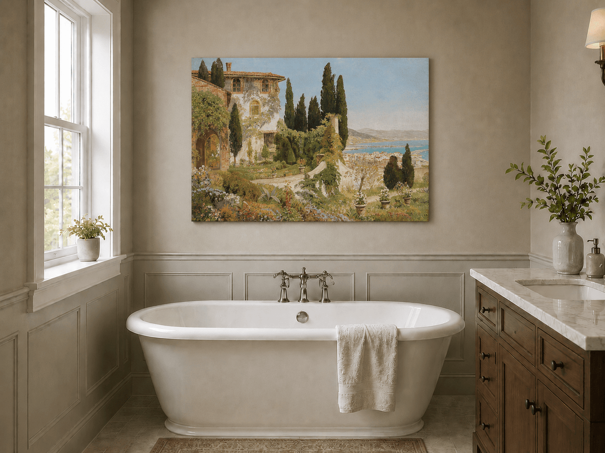 Unframed hand-painted Italian garden oil painting with cypress trees overlooking the sea displayed above a freestanding bathtub.