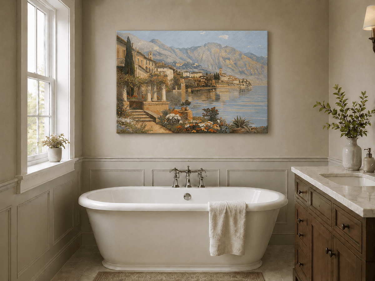 Unframed hand-painted lakeside village oil painting with flowers and mountains displayed above a freestanding bathtub.