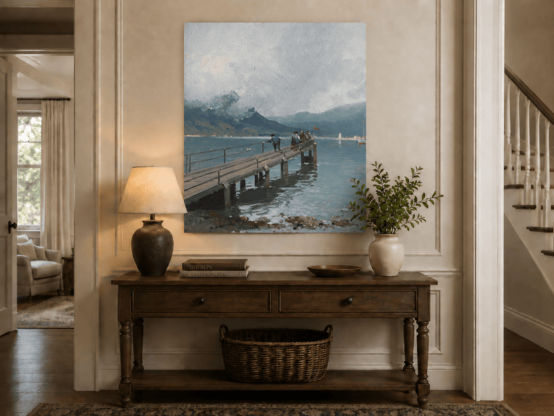 Alpine lake pier with figures and boats landscape painting shown as decorative oil art in a home interior.