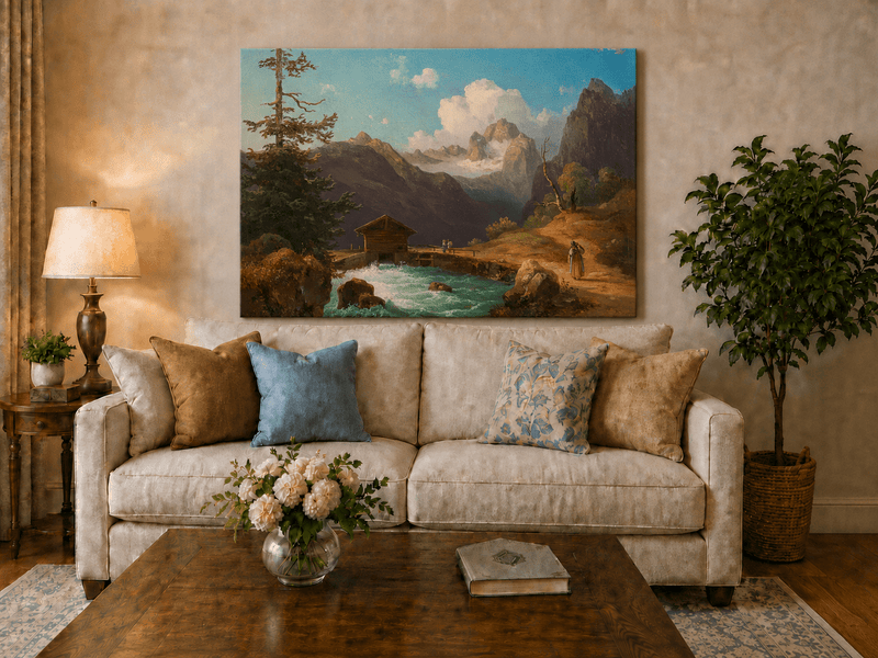 Hand-painted alpine river cabin and mountain valley landscape oil painting displayed above a sofa in a living room interior.