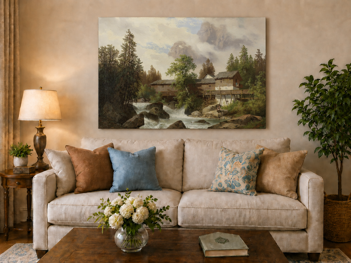 Hand-painted alpine watermill, stream and misty mountain peaks landscape oil painting displayed above a sofa in a living room interior.