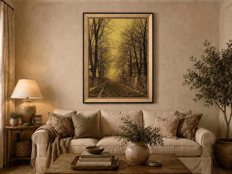 Autumn tree-lined country road at sunset landscape oil painting displayed in a styled home interior.