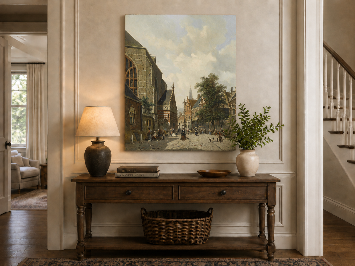 Interior wall art view featuring a charming town square with church and figures oil painting.