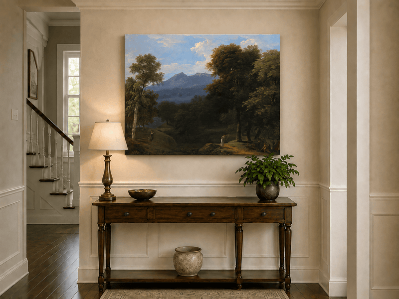 Hand-painted classical forest landscape with figures oil painting displayed above a console table in a hallway interior.