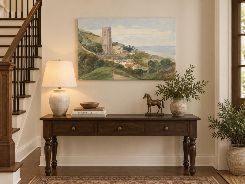 Hand-painted Coastal Church and Village Hillside View landscape oil painting displayed as wall art in a styled interior