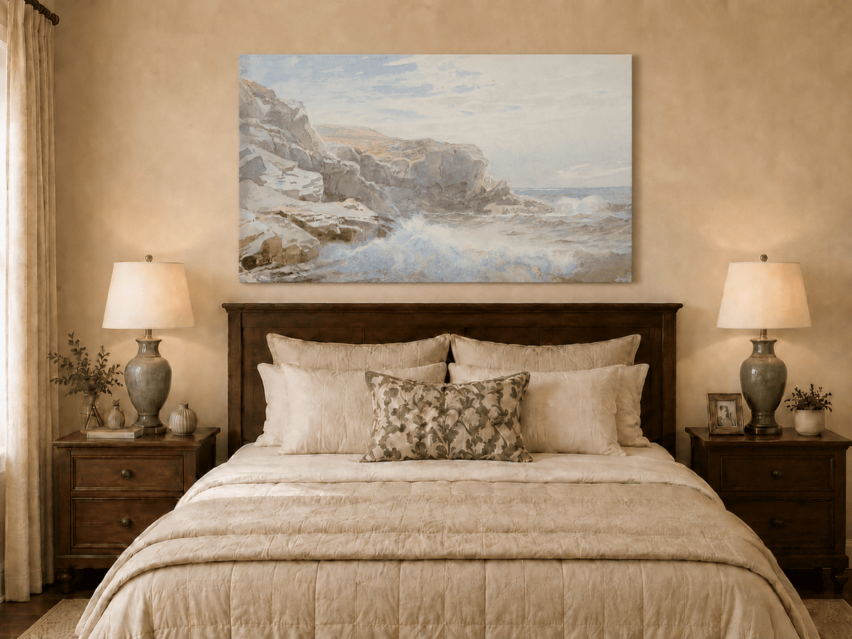 Unframed hand-painted coastal cliffs oil painting with waves breaking along the rocky shore displayed above a wooden bed in a neutral bedroom.