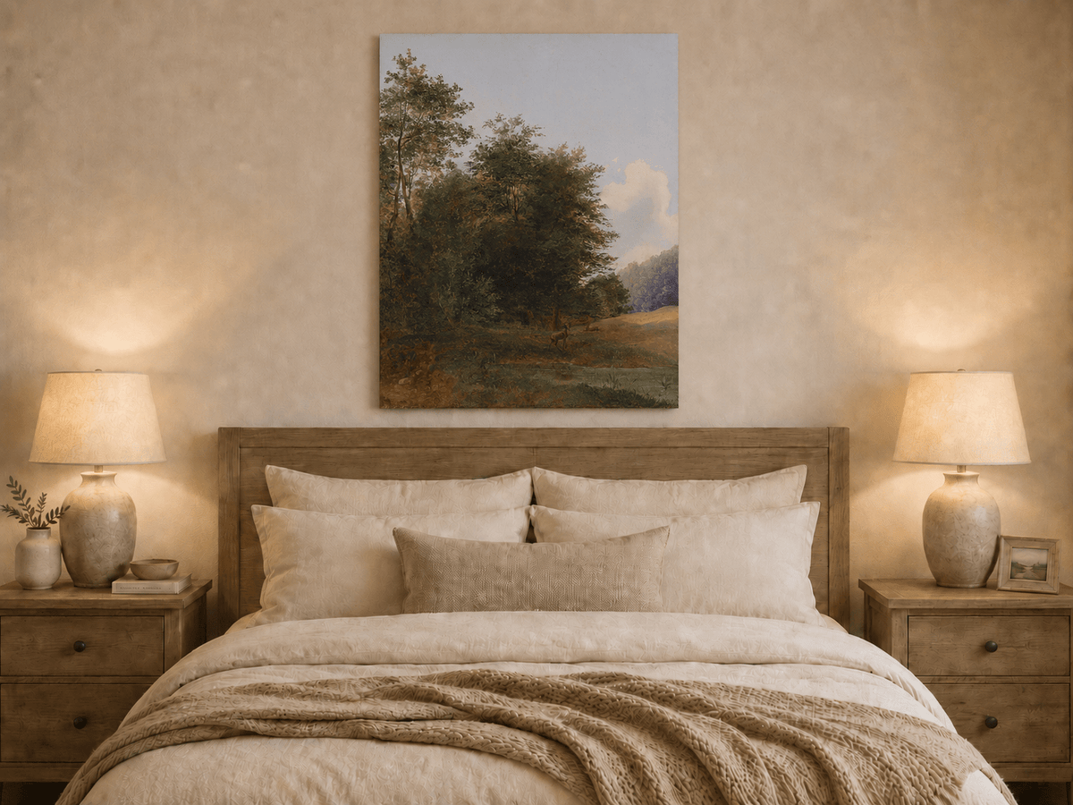 Hand-painted deer by a quiet forest pond landscape oil painting displayed above a bed in a bedroom interior.