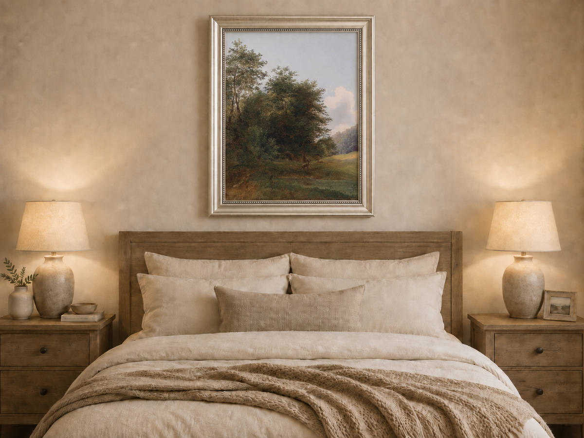 Hand-painted deer by a quiet forest pond landscape oil painting displayed above a bed in a bedroom interior.