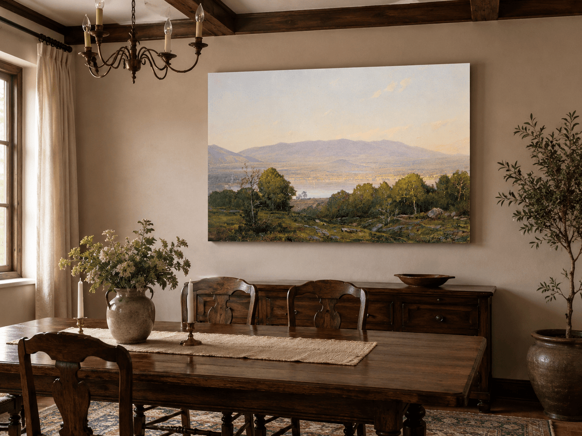 Unframed hand-painted dusk lake oil painting with distant mountains and wooded hills displayed above a formal dining table.