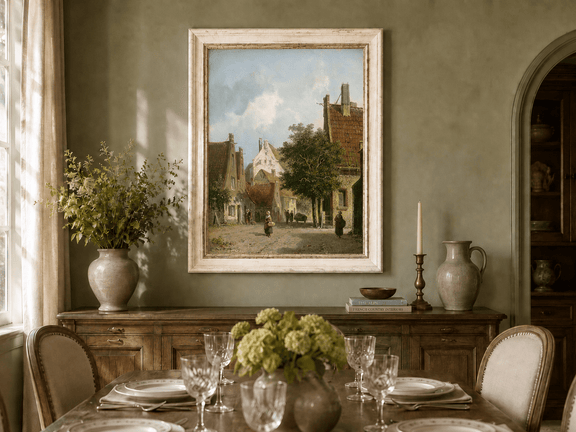 European village street scene oil landscape artwork shown in a styled home interior.