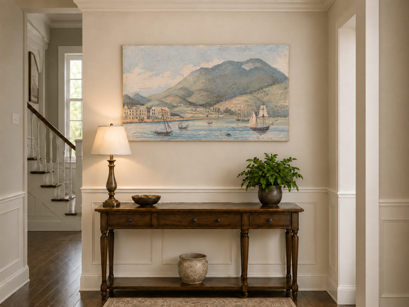 Hand-painted Harbor Town with Sailboats and Mountains landscape oil painting displayed as wall art in a styled interior