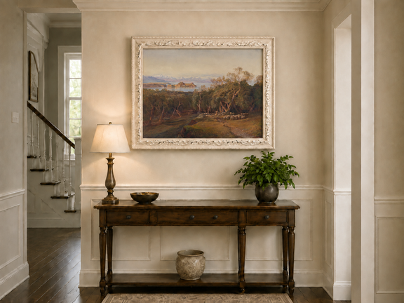 Hand-painted Mediterranean coastal island fortress landscape oil painting displayed above a console table in a hallway interior.