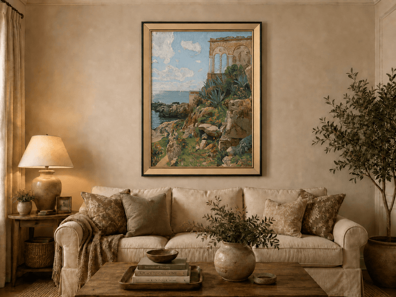 Hand-painted Mediterranean coastal ruins with arch and succulents landscape oil painting displayed above a sofa in a living room interior.