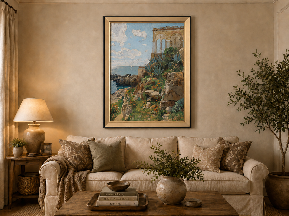 Hand-painted Mediterranean coastal ruins with arch and succulents landscape oil painting displayed above a sofa in a living room interior.