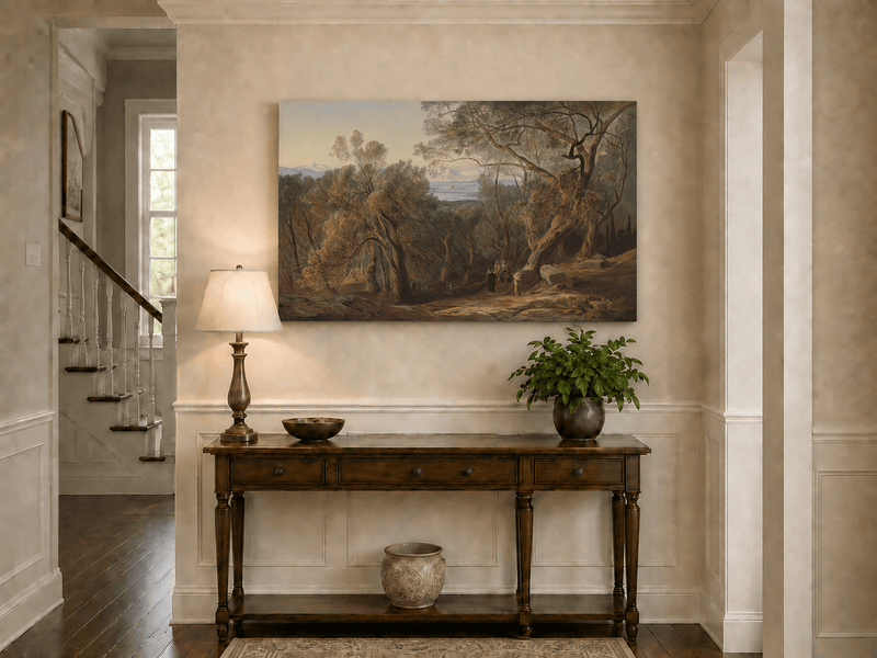 Hand-painted Mediterranean woodland, bay, fortress and figures landscape oil painting displayed above a console table in a hallway interior.