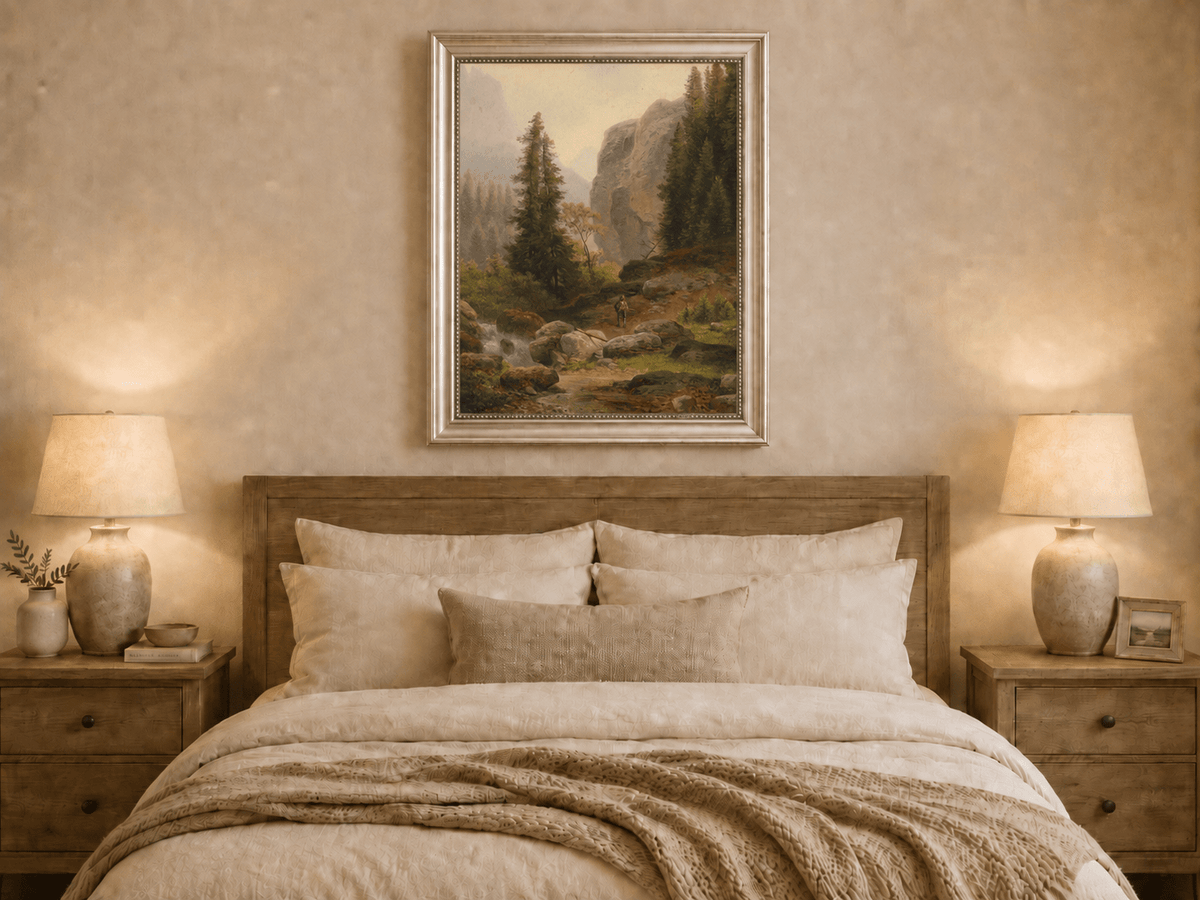 Hand-painted mountain gorge, stream and pine-filled rocks landscape oil painting displayed above a bed in a bedroom interior.