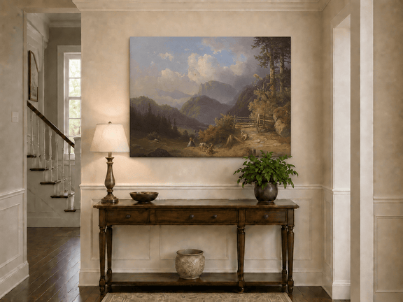 Hand-painted mountain path with goats, a figure and wooden gate landscape oil painting displayed above a console table in a hallway interior.