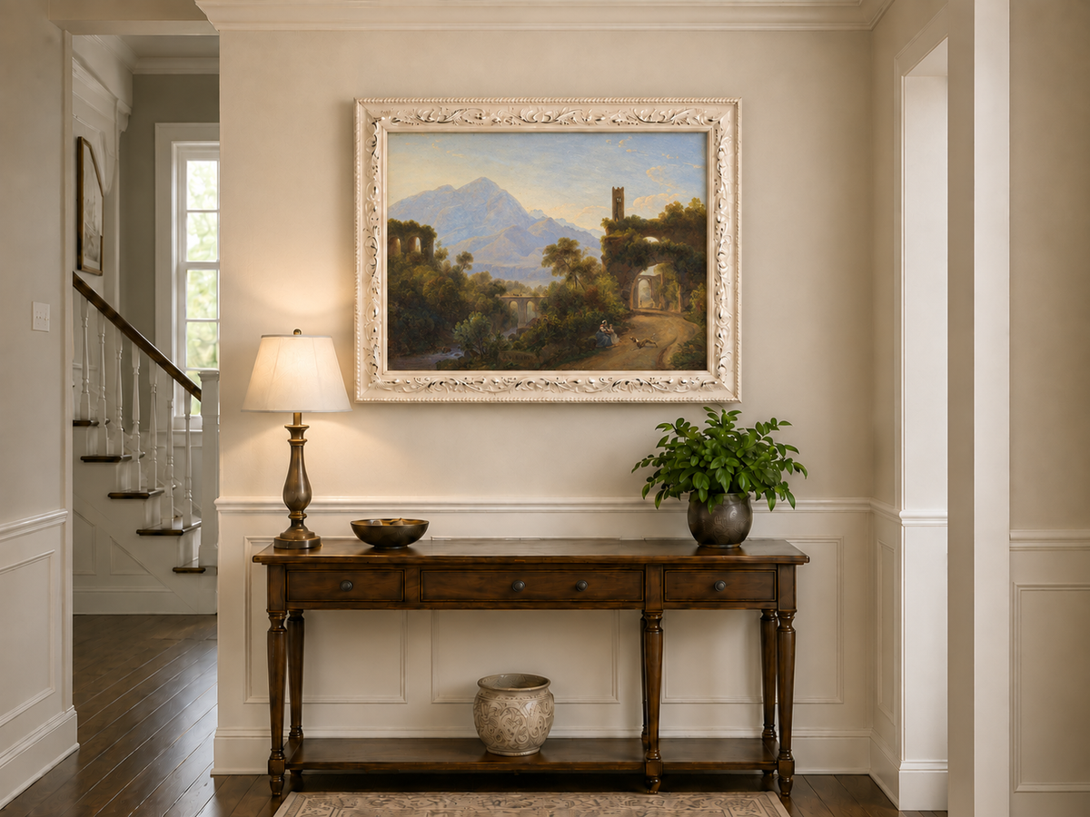 Hand-painted Mountain Ruins and Sunlit Valley Road landscape oil painting displayed as wall art in a styled interior