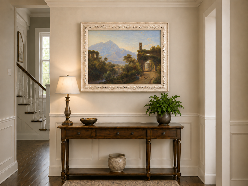 Hand-painted Mountain Ruins and Sunlit Valley Road landscape oil painting displayed as wall art in a styled interior