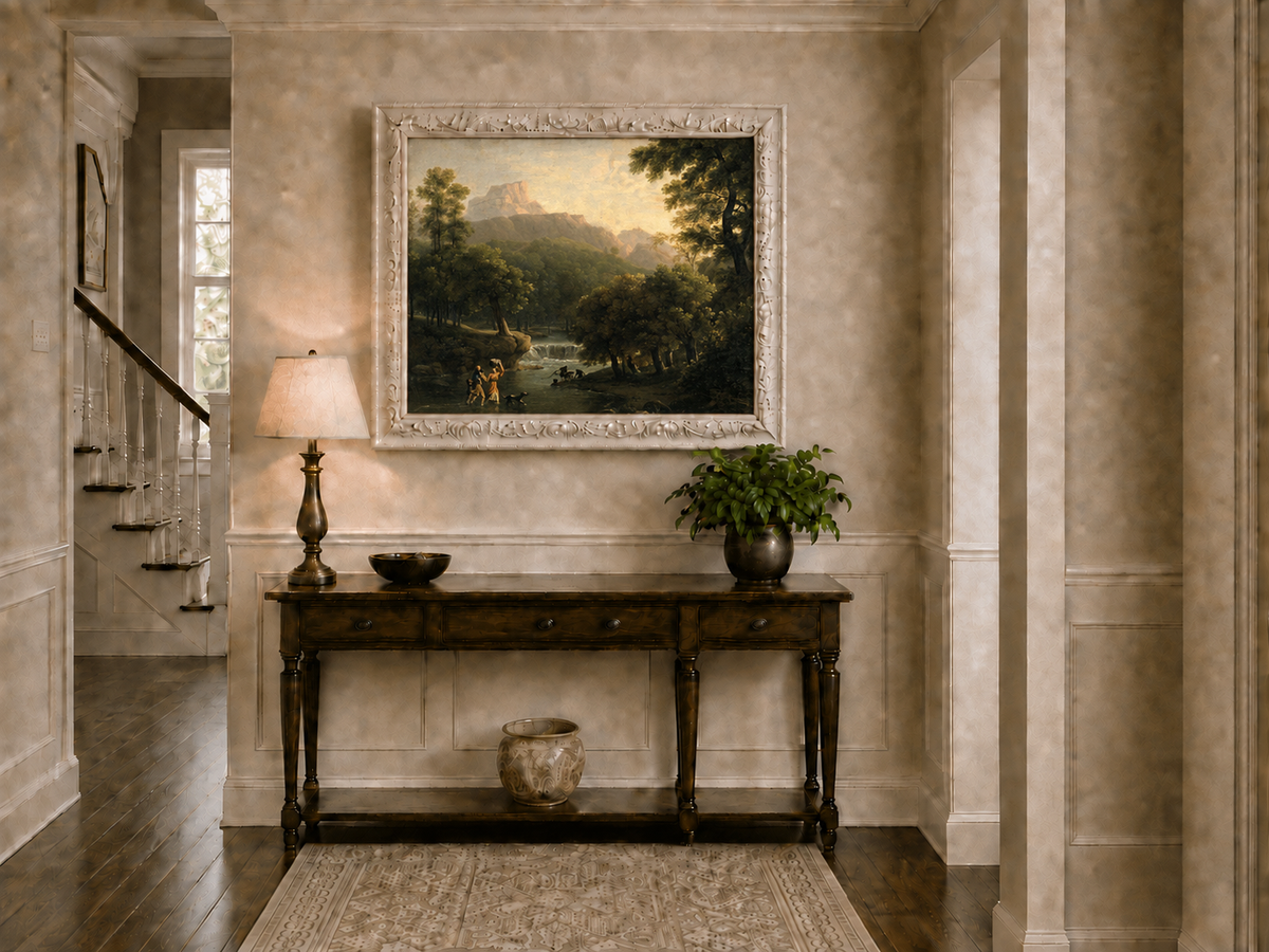 Hand-painted mountain stream with figures at dawn landscape oil painting displayed above a console table in a hallway interior.