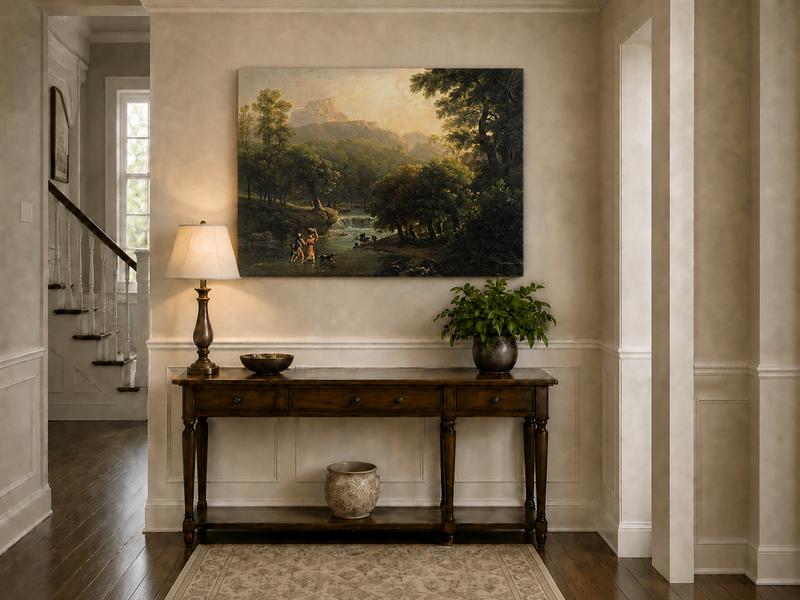 Hand-painted mountain stream with figures at dawn landscape oil painting displayed above a console table in a hallway interior.