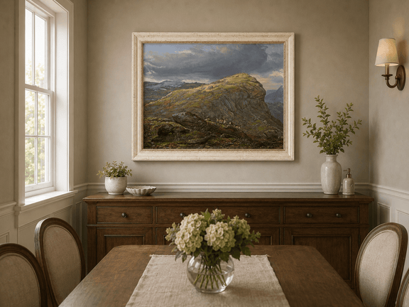 Mountain top and reindeer oil landscape artwork shown in a styled home interior.