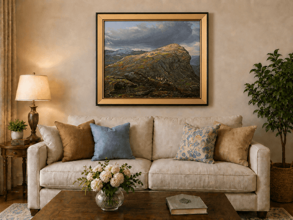 Mountain top with reindeer and dramatic sky landscape oil painting displayed in a styled home interior.