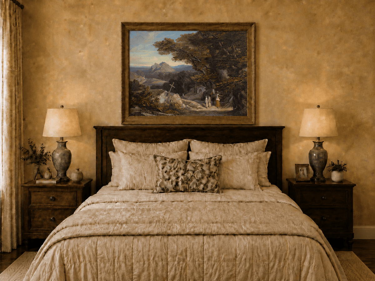 Hand-painted path with figures, cross and distant mountain peaks landscape oil painting displayed above a bed in a bedroom interior.