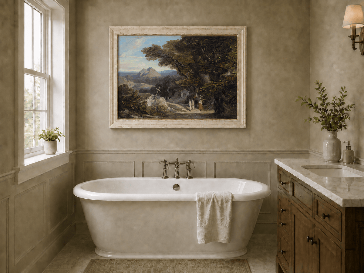 Hand-painted path with figures, cross and distant mountain peaks landscape oil painting displayed in a bathroom interior above a bathtub.