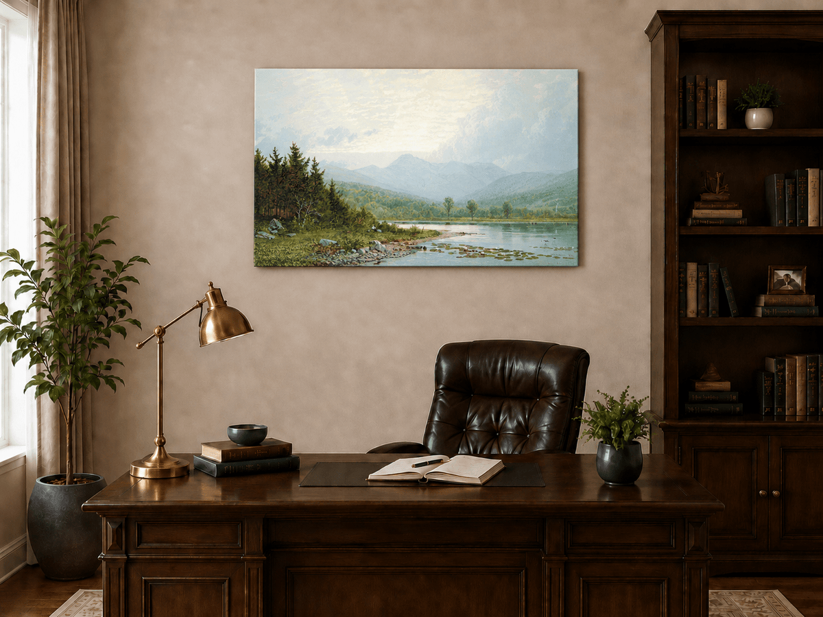 Unframed hand-painted lake shore oil painting with pine shade, still water and mountain peaks displayed above a traditional home office desk.