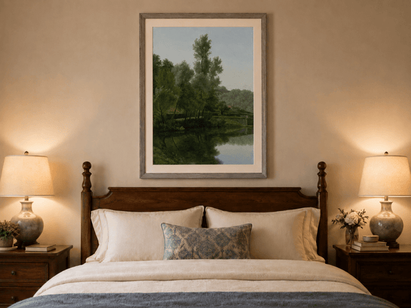 Hand-painted quiet riverside trees and reflections landscape oil painting displayed above a bed in a bedroom interior.